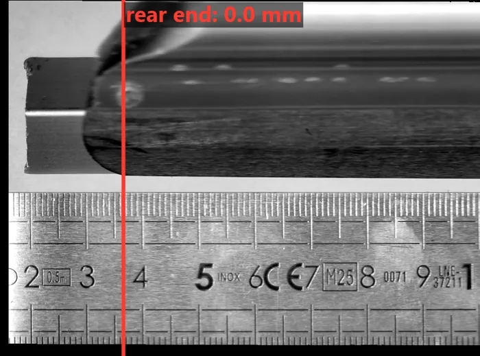 The whole blade stitched into one picture beside the ruler
